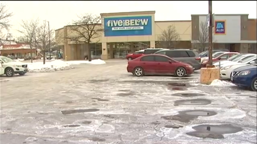 Mom injured trying to save son, 8, inside vehicle carjacked from North Side parking lot