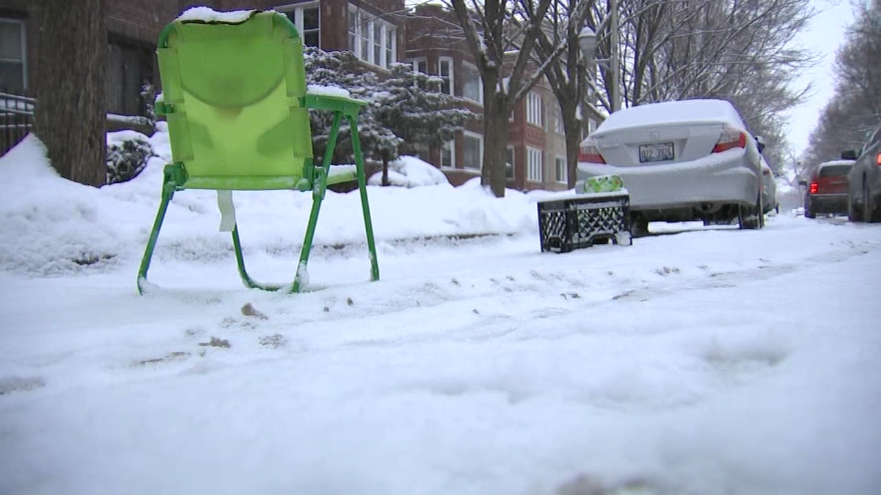 Chicagoans digging out again before snow freezes over