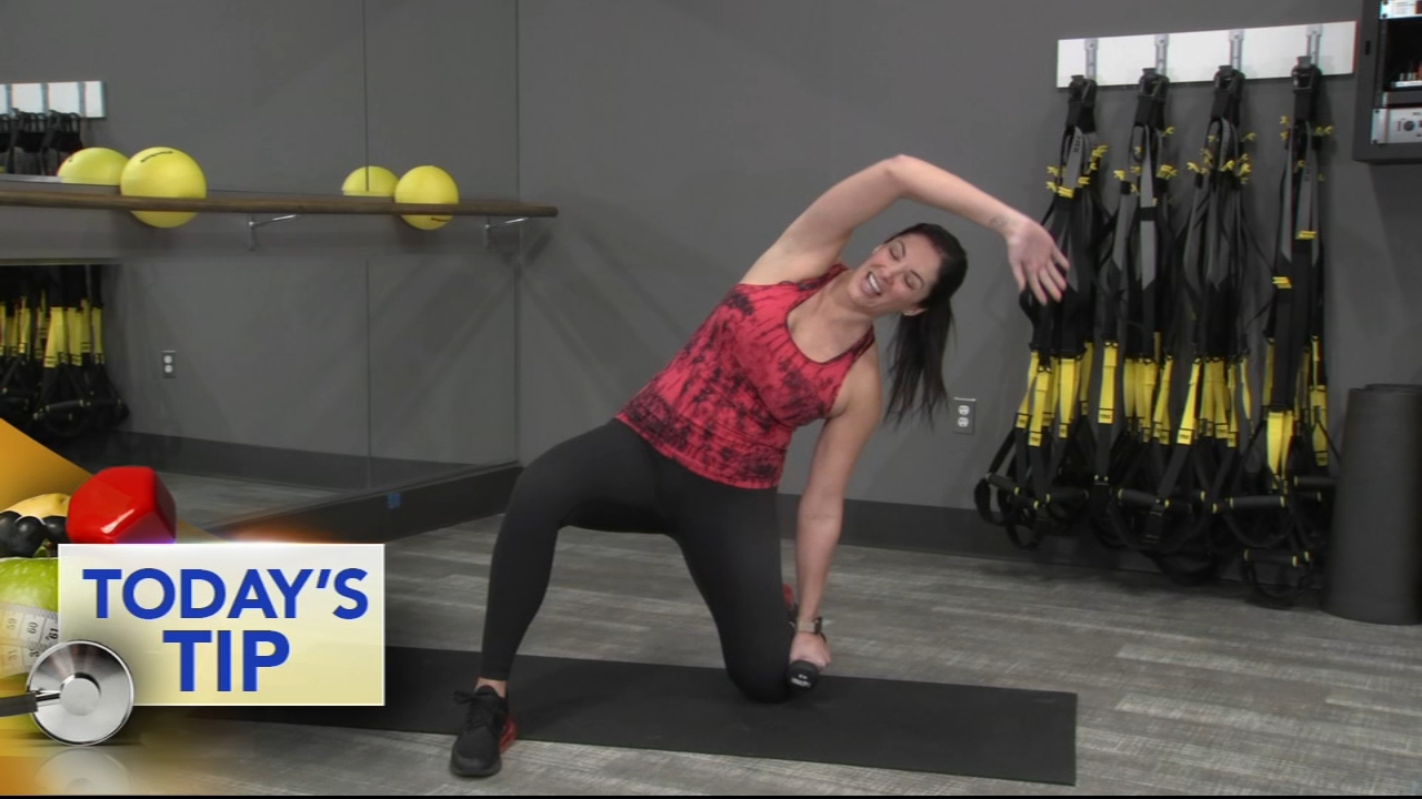 Bicep curl & oblique reach - Today's Tip
