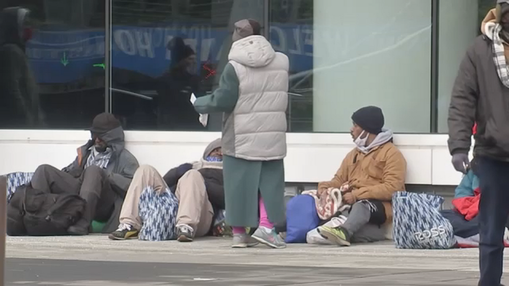 People wait over 6 hours in cold for shelter at George R. Brown