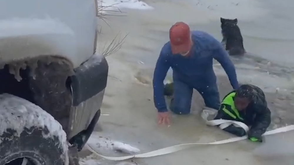 Boy rescued from icy Texas pond after dog walker spots him