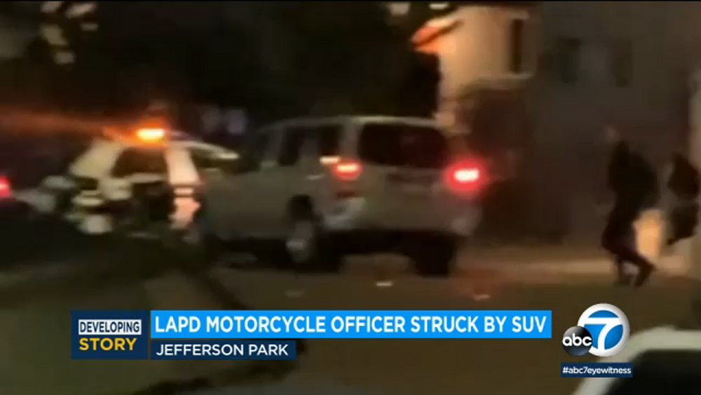 LAPD motorcycle officer struck by SUV, rushed to hospital 