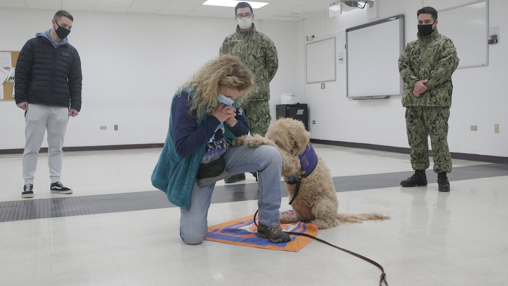 Therapy dogs bring smiles, 'fur-filled' memories to naval base