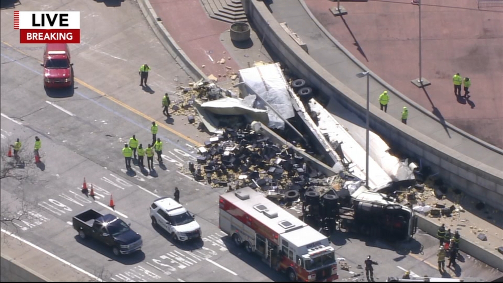 Tractor-trailer overturns, spills load on Ben Franklin Bridge