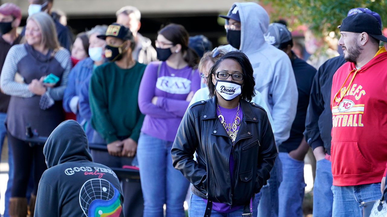 It's now illegal in Georgia to give food, water to voters in line