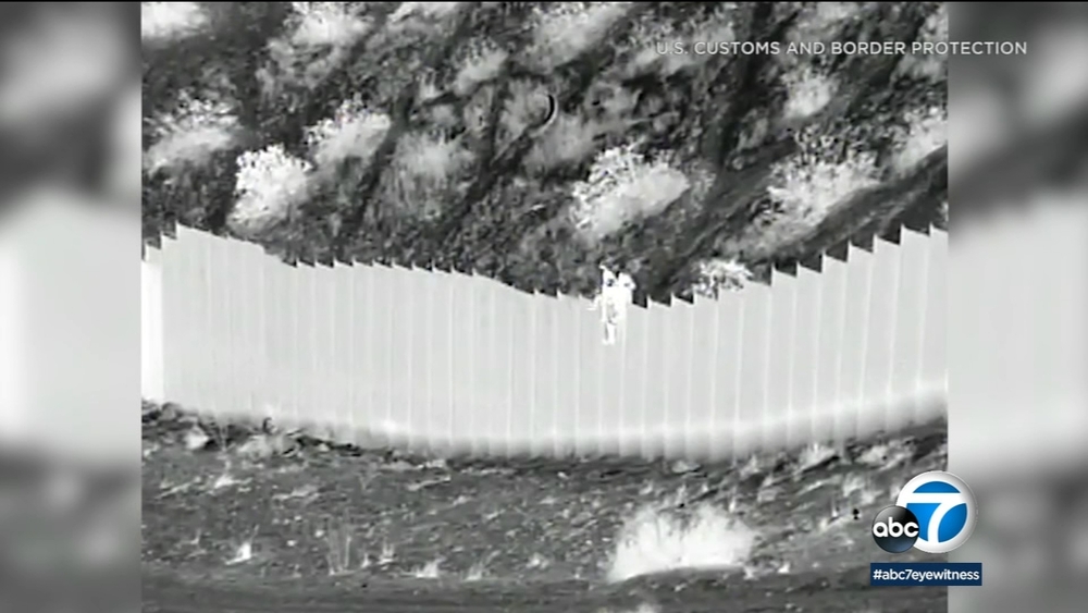 Smugglers drop toddler sisters from 14-foot border wall