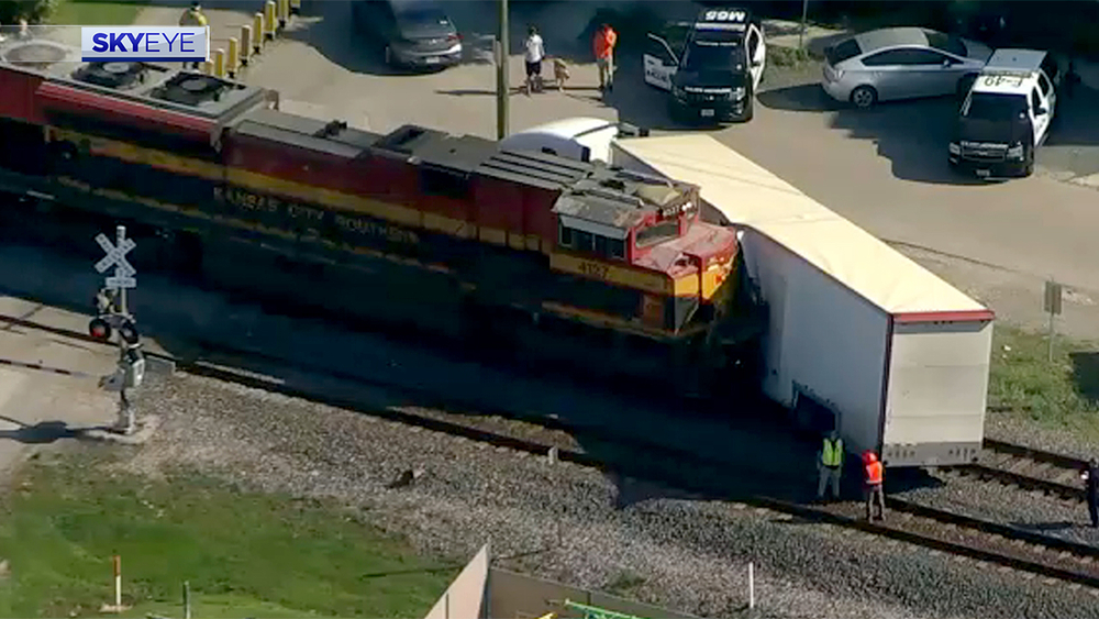 Train crashes into semi-truck near Houston Heights