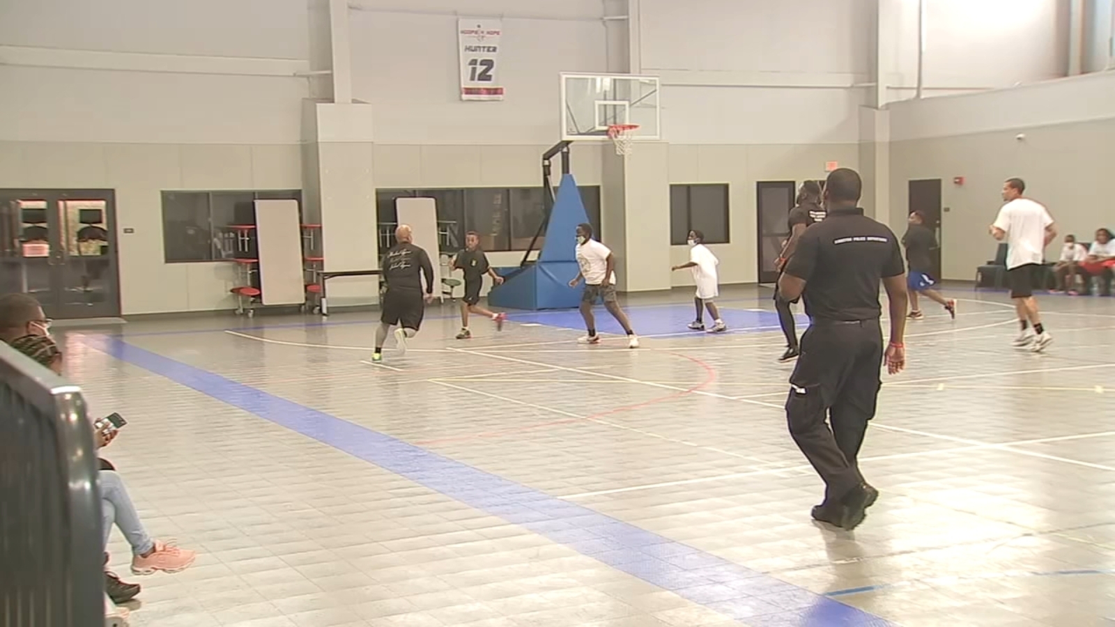 Officer Python's Basketball Houston law enforcement officers build healthy relationships with inner ...
