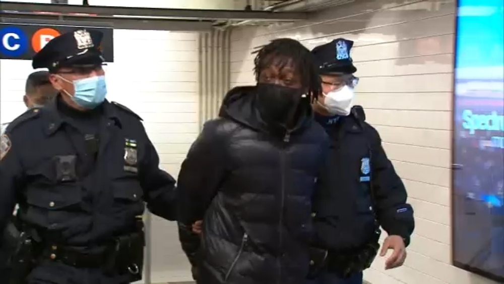 Man with rifle at Times Square subway station arrested, charged