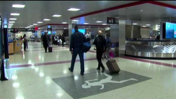 A United Airlines flight headed to Chicago was delayed for nearly an hour in Boston after police said a passenger made a fake bomb threat. 