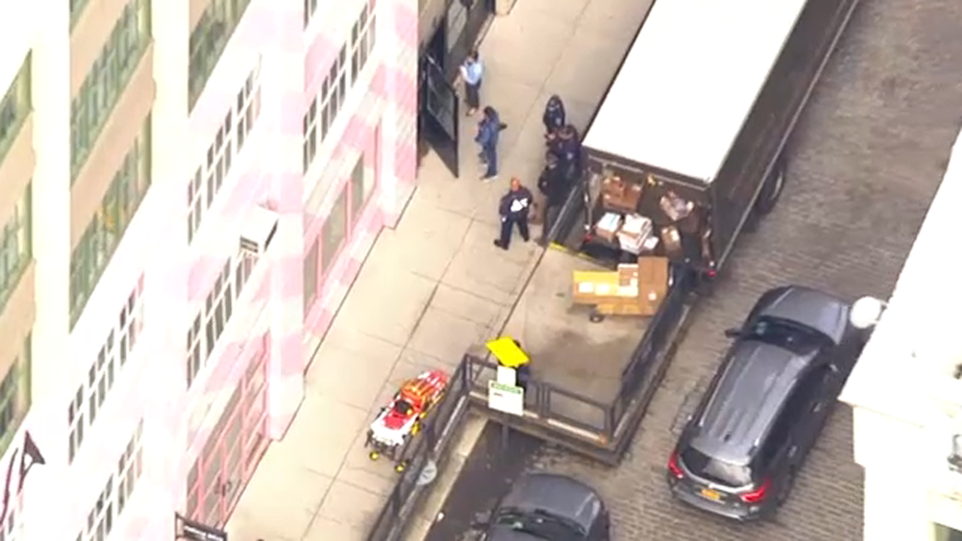 Freight elevator drops with 25 people inside in NYC