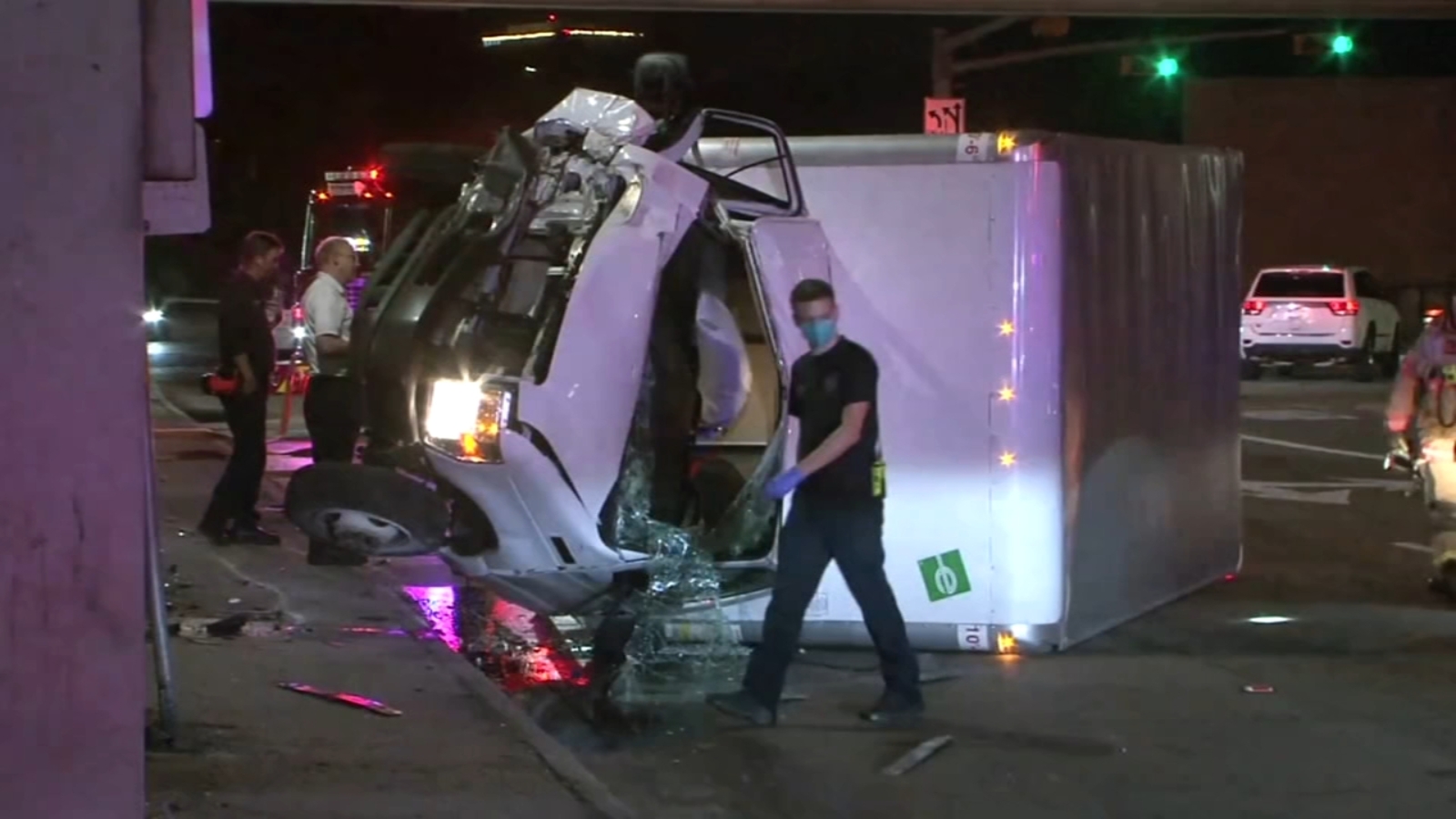 Video shows box truck roll over after hitting concrete pillar under US59 at Chimney Rock