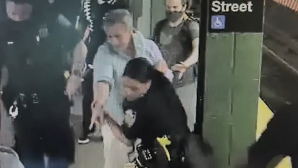 Man intervenes as woman slashed on subway platform