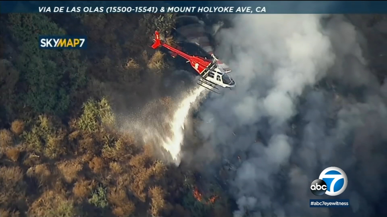 Fire erupts above PCH in Pacific Palisades