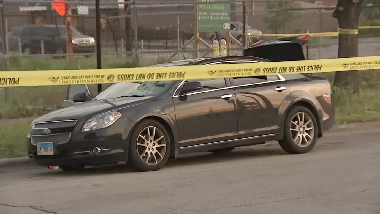 Man changing friend's flat tire shot by carjacker near Midway