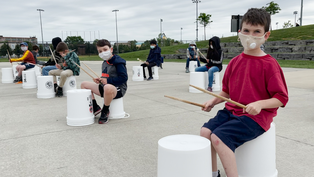 Jersey City kids find their rhythm through bucket-drumming class