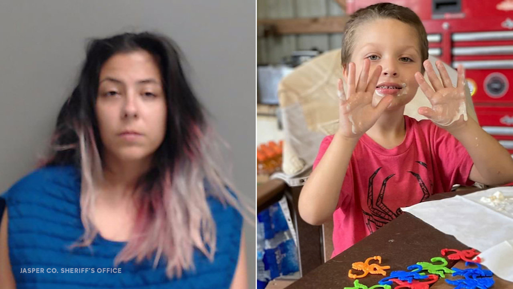 Girlfriend of missing boy's dad charged after body found