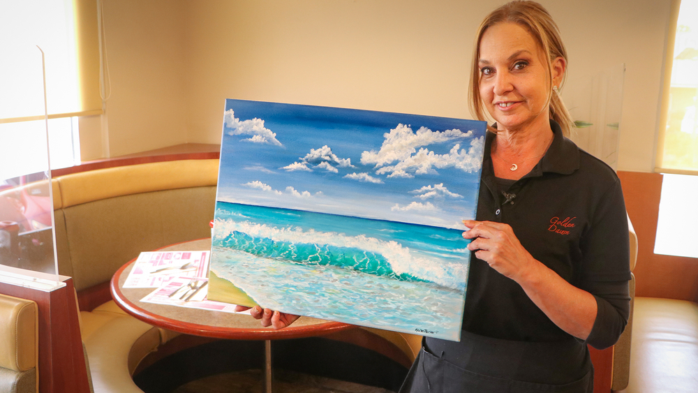 This waitress paints masterpieces to display at the Golden Dawn Diner
