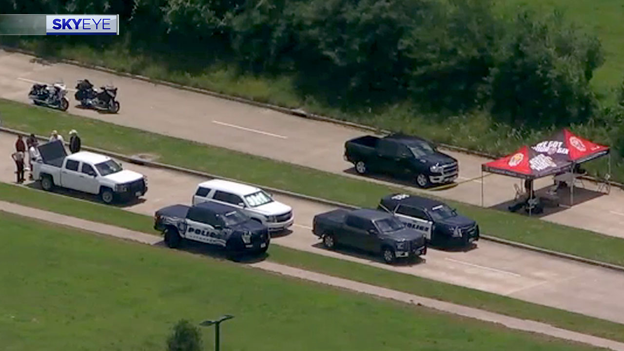 Officer opened fire as he was dragged by traffic stop suspect
