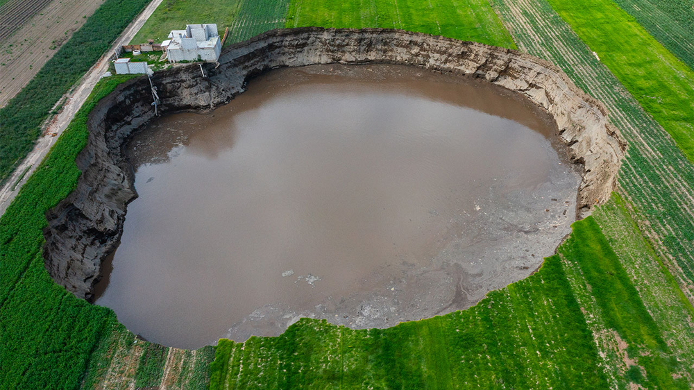 Sinkhole in Mexico now larger than football field, traps 2 dogs