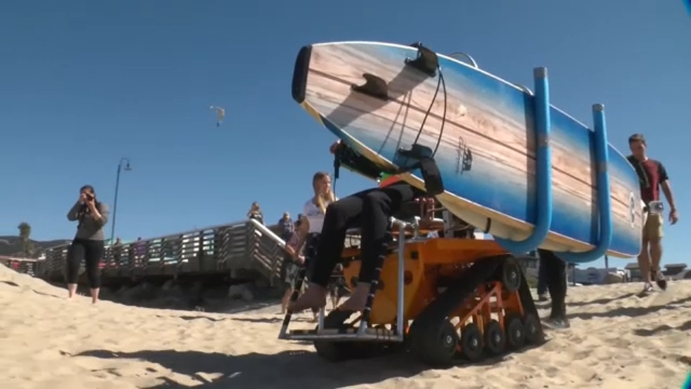 Unique wheelchair helps disabled go surfing