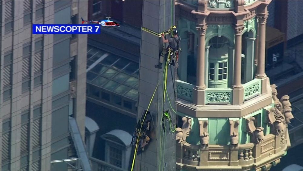 Afraid of heights? Workers spotted scaling NYC's Chrysler Building