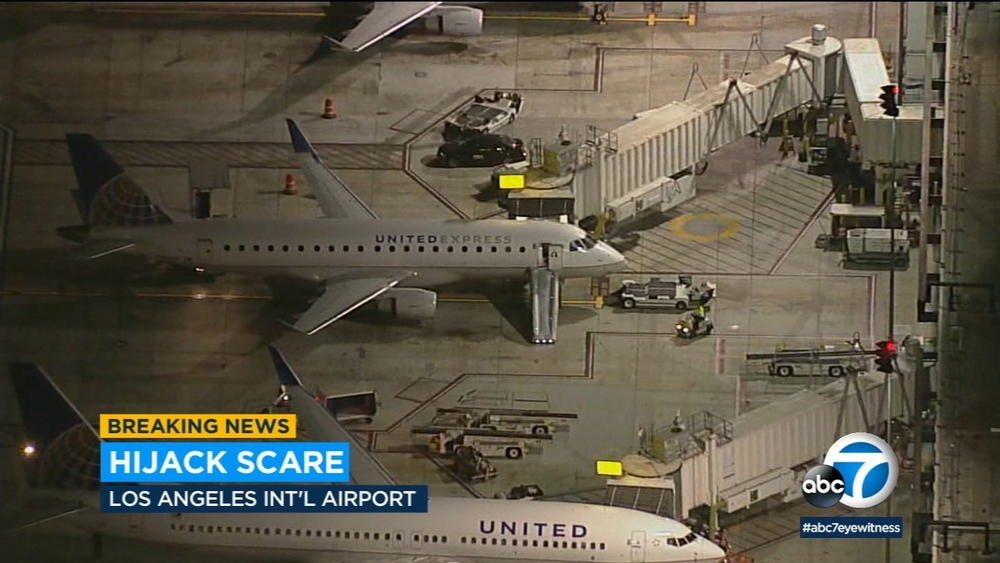 LAX: Man hospitalized after opening plane door, exiting onto taxiway