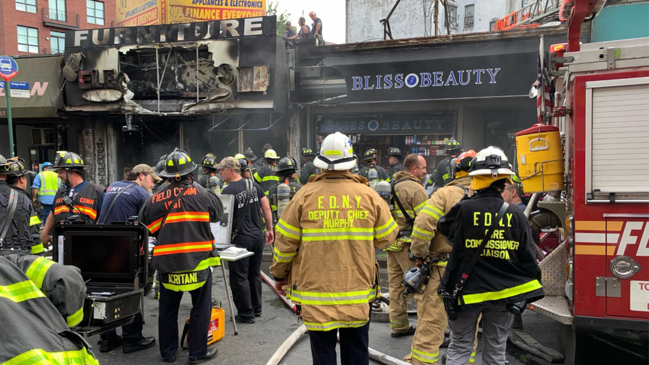 4-alarm fire rips through Bronx stores