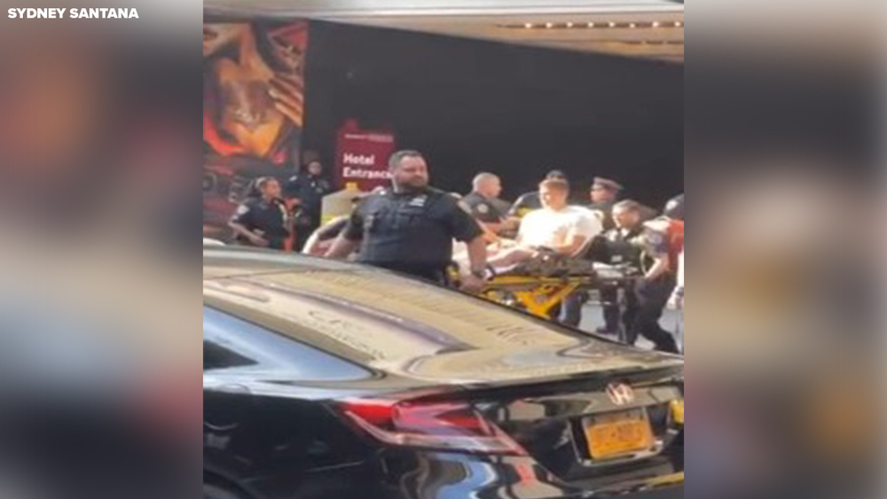 Times Square shooting victim carted off in stretcher