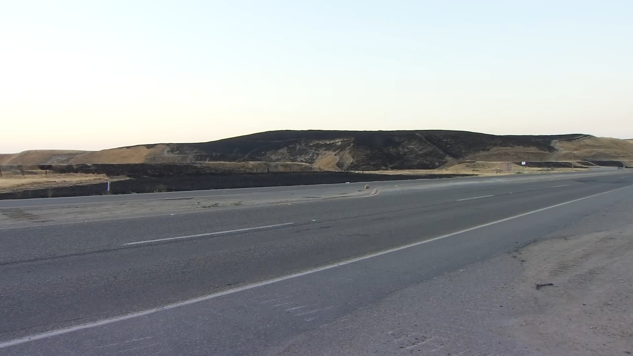 Brush fire burning near Friant Road 90% contained, roads reopened