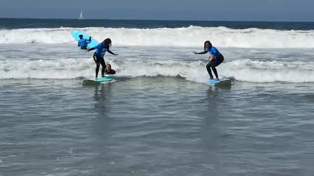 Local group aims to fight racism by providing free surf lessons