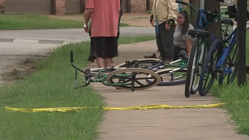 Driver knocks woman off bike and gets shot by another bicyclist