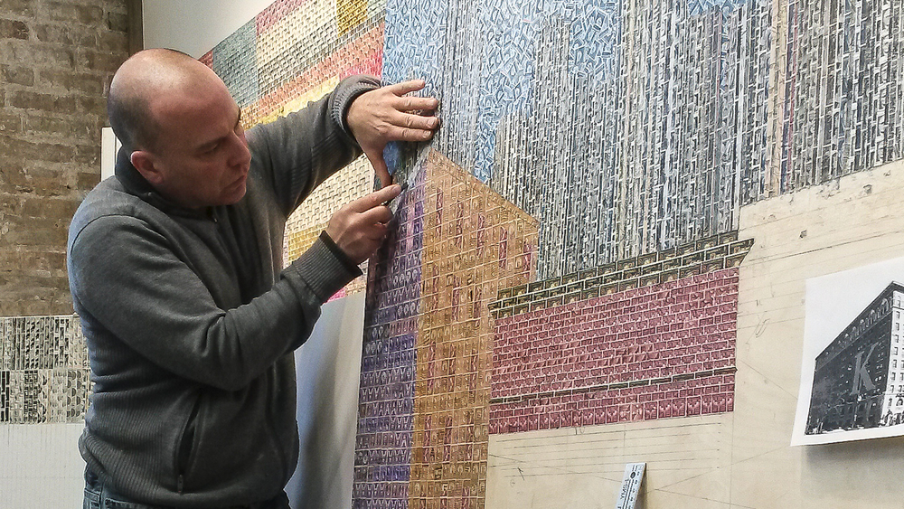 Chicago artist creates masterpieces with used stamps