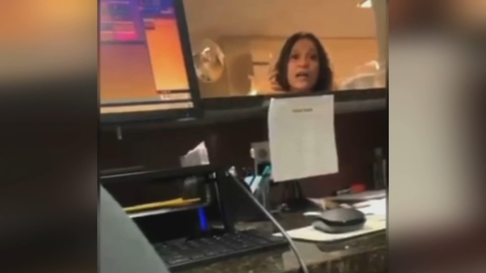 Video shows woman hurling racial slurs at motel clerk