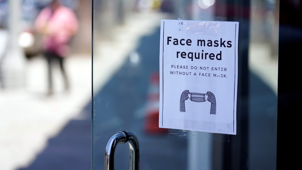 NY lifts mask mandate for businesses, keeps it for schools