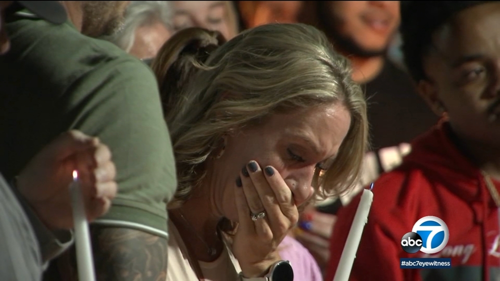Vigil honors 2 teens killed at Corona theater