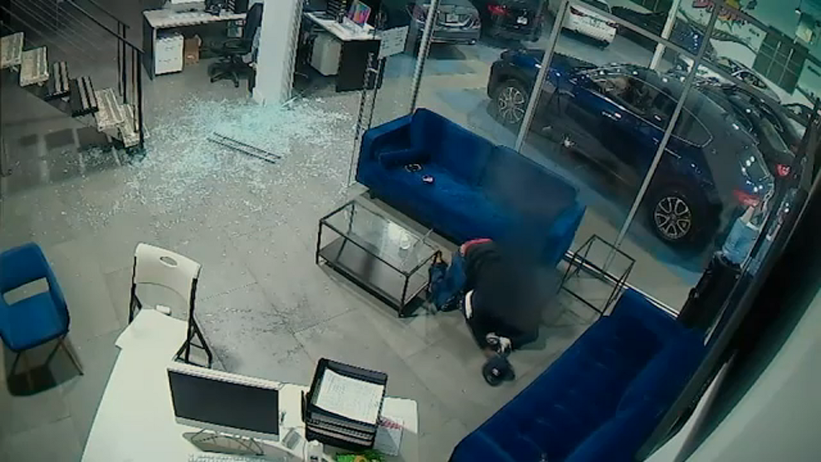 Reputed gang members charged in Bronx car dealership shooting, other