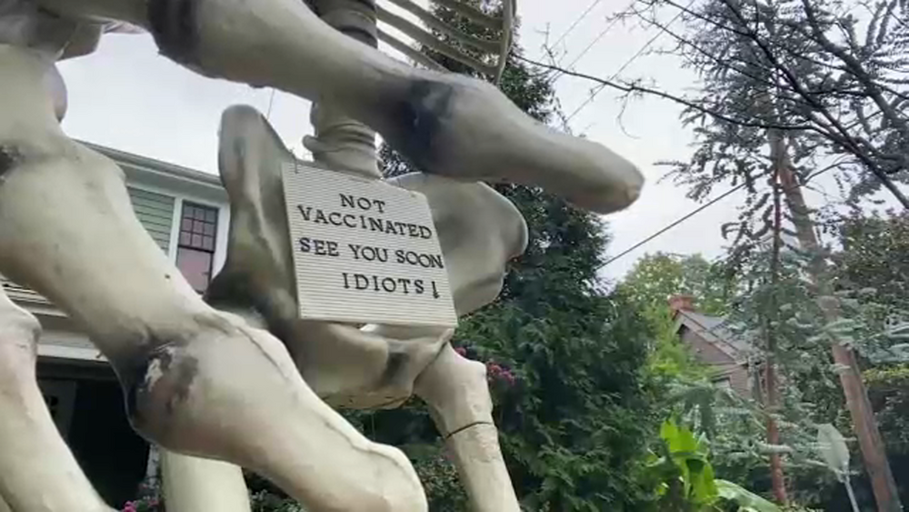 Raleigh man uses Halloween display to make plea to unvaccinated