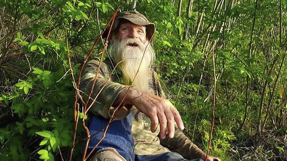 Fire destroys cabin of man forced out of woods, jailed
