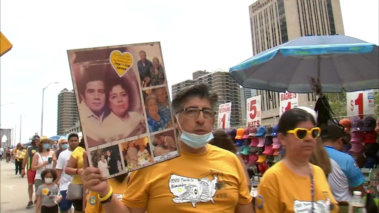 Hundreds march in NYC to remember loved ones lost to COVID