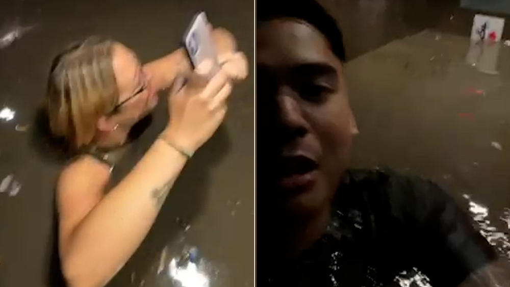 Man records getting stuck in elevator with neck-deep floodwaters