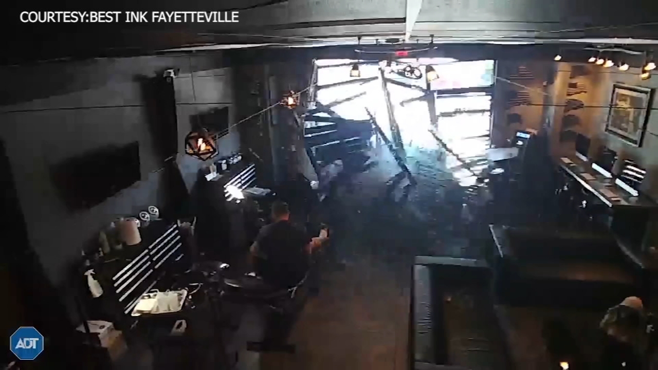 Shocking video shows car smashing into Fayetteville tattoo parlor