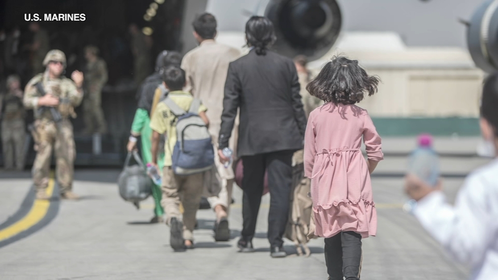 Afghanistan evacuations resume after bombing attack