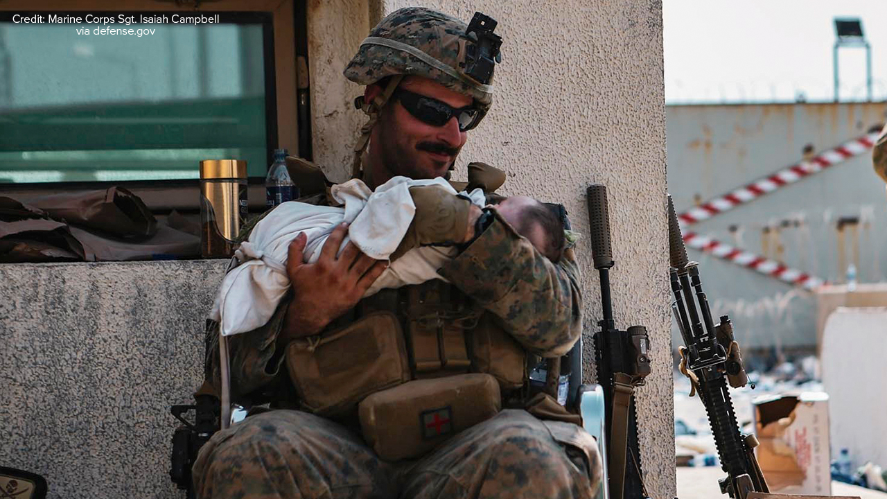 Member of WABC family reflects on Marine son holding baby