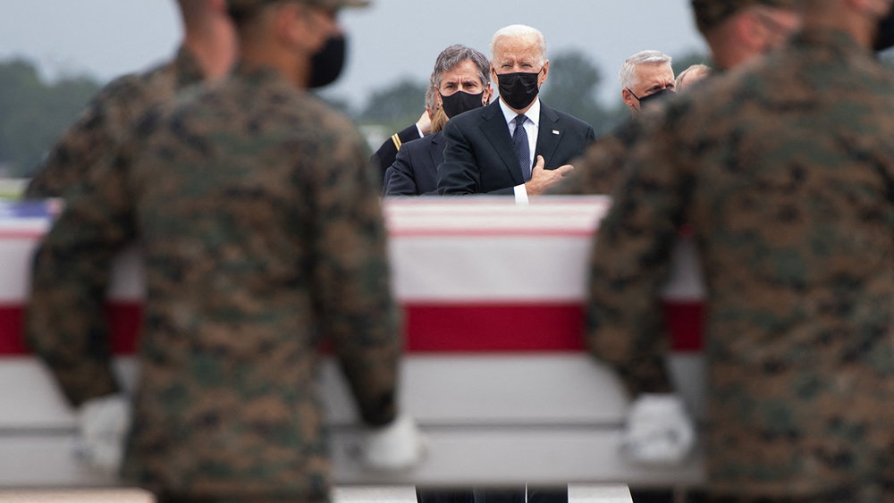 Bidens attend dignified transfer of troops