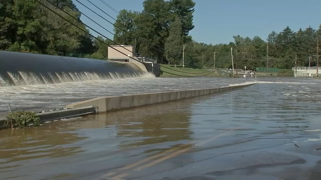 Pickering Creek crests over dam near Phoenixville