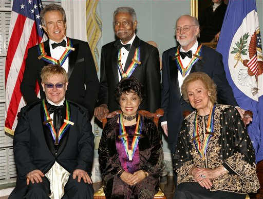 Recipients of the 27th annual Kennedy Center Honors pose for a photo following a dinner celebrating their lifetime achievements in the arts at the State Department on Dec. 4, 2004.