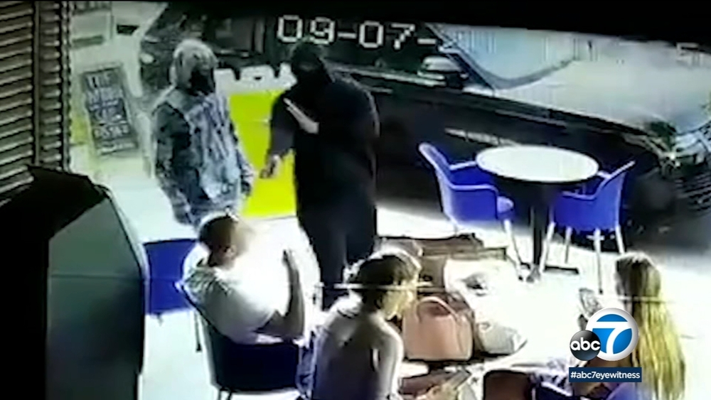 Video: Sidewalk diners robbed at gunpoint on Melrose