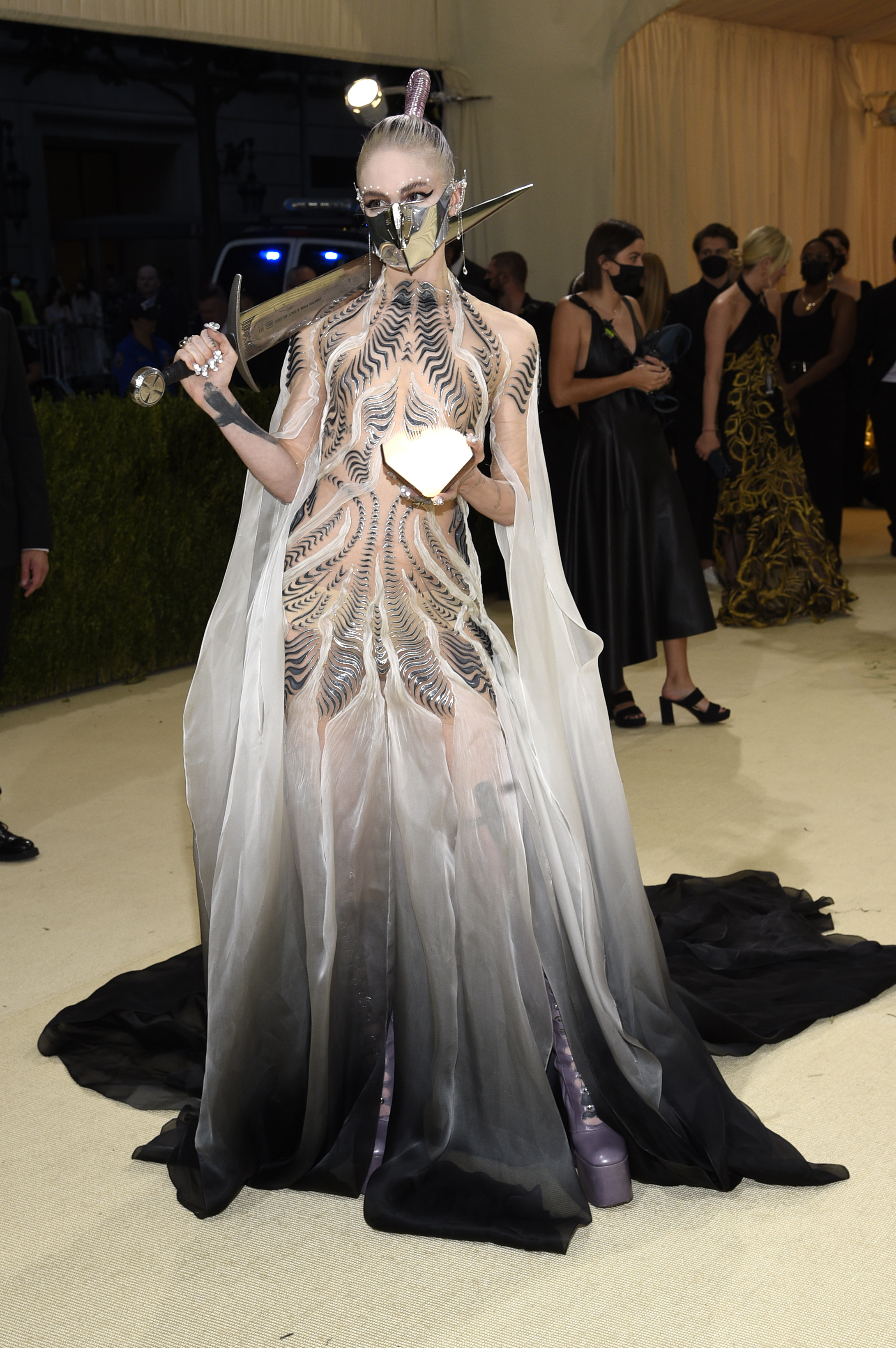 Grimes attends The Metropolitan Museum of Art's Costume Institute benefit gala. (Photo by Evan Agostini/Invision/AP)
