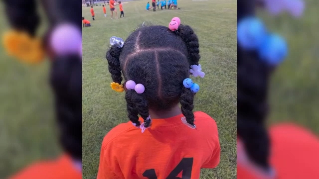 Girl, 6, removed from Hope Mills soccer game over hair clips and bows